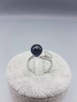 A sterling silver ring with a black onyx stone.