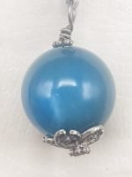 A KEYCHAIN WITH BLUE AGATE on silver chain.