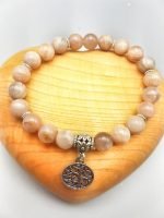 A PINK MOONSTONE BRACELET WITH TREE OF LIFE PENDANT