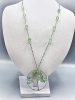 A TREE OF LIFE GREEN AVENTURINE NECKLACE on mannequin.