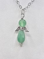 A GREEN AVENTURINE ANGEL PENDANT on a silver chain.