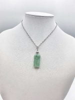 A necklace with green jade stone and AMAZONITE BARREL PENDANT.