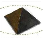 A 4 CM black SHUNGITE PYRAMID with the word Giza written on it, made of shungite.