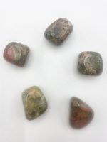 A group of red, green and yellow UNAKITE TUMBLED stones.