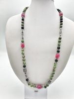 A RUBY, RUBY JADE AND BLACK ONYX ZOISITE NECKLACE with pink, green and black pearls.