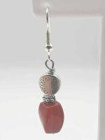 A pair of LONG RED CARNELIAN EARRINGS to find stability.