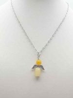 YELLOW CALCITE ANGEL PENDANT with a silver chain.