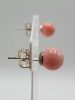 A pair of stud earrings Pink Coral Earrings in Sterling Silver.