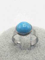 A RING WITH TURQUOISE.