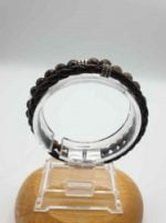 Men's bracelet with tiger's eye, brown leather cord and steel clasp.