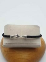 Black leather bracelet with silver clasp and MEN'S BRACELET WITH HEMATITE, WHITE HOWLITE AND BLACK LEATHER CORD.