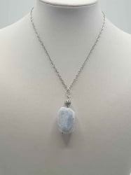 There are a chalcedony pendant necklace with a blue stone.