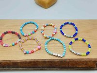 A set of colorful bracelets BRACELET FOR CHILDREN WITH NAME personalized with children's names.
