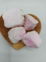 Marshmallows RAW PINK ARAGONITE in a wooden bowl.